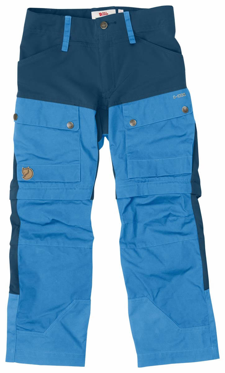 Fjällrävenin G-1000 -kankaasta valmistetut Kids Keb Gaiter -katkolahjehousut (179 €) sisältävät kaikki samat yksityiskohdat kuin aikuisten huippumallissa